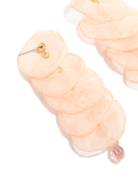 Crafted with pink fabric round layered drop earrings in statement style featuring beads with beige, pink and gold tones close up view - link has visual effect only