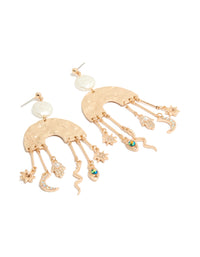 Showcasing brushed gold rainbow and celestial drop earrings with statement style featuring pearl, evil-eye, hamsa hand, snake, moon, sun, star charms with pearl front view - link has visual effect only