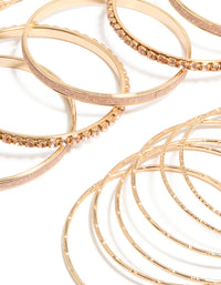 Showcasing gold pink diamante bangles in a stackable 21-pack, close up view - link has visual effect only