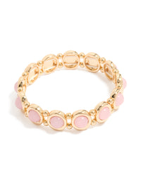 Discover this beaded organic shaped stretch bracelet in gold and pink front view - link has visual effect only