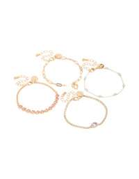 Showcase your wrist candy with this gold diamantes and heart charm bracelet 4-pack featuring beads in light pink, powder blue, and clear stone front view - link has visual effect only