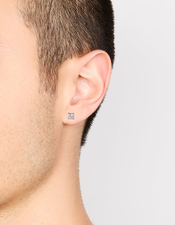 Presenting mens waterproof mini square clear cubic zirconia stud earrings in stainless steel with silver on ear view