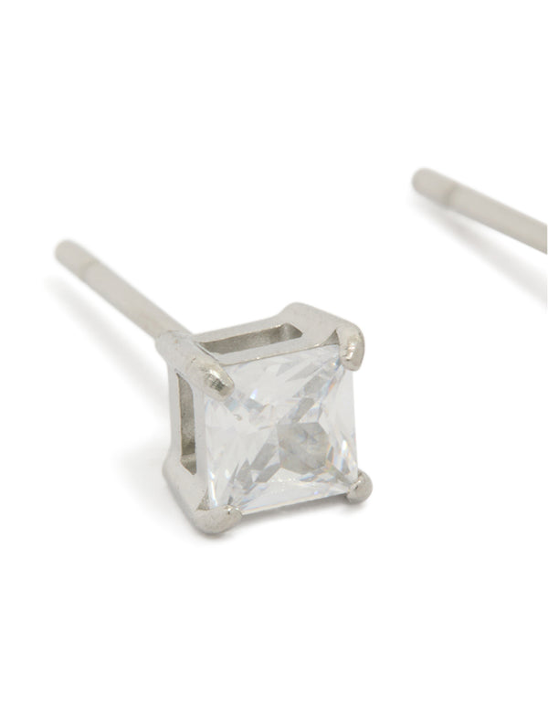 Highlighting mens waterproof mini square clear cubic zirconia stud earrings in stainless steel with silver finish close up view