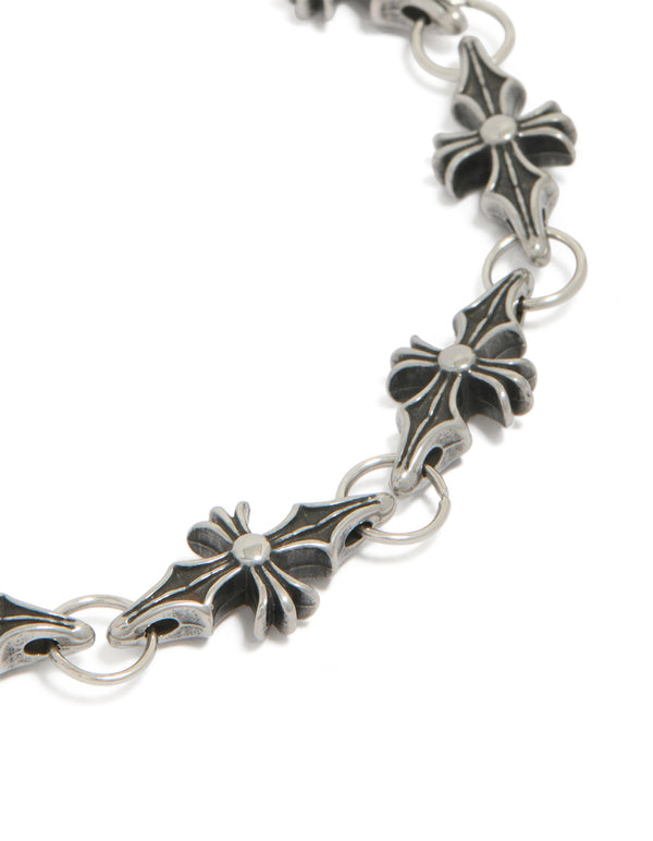 Designed with waterproof stainless steel cross links in silver and black close up view