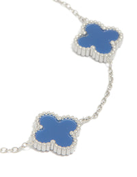 Featuring a mens waterproof stainless steel navy clover chain bracelet with charm accents in cornflowerblue and silver, statement design close up view - link has visual effect only