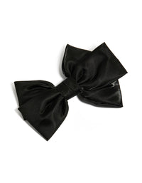 Elegant bow clip featuring solid print in shiny black with statement styling front view - link has visual effect only