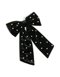 Beautiful black velvet bow clip featuring polkadot print with pearl embellishments statement style front view - link has visual effect only