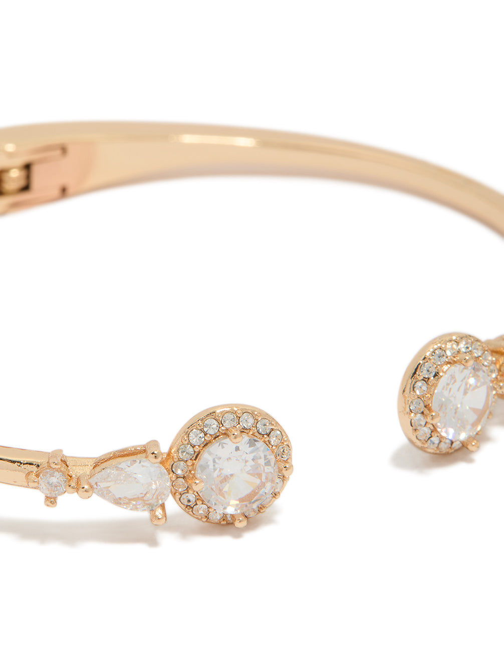 Designed with gold cubic zirconia hinged circle open wrist cuff bracelet close up view