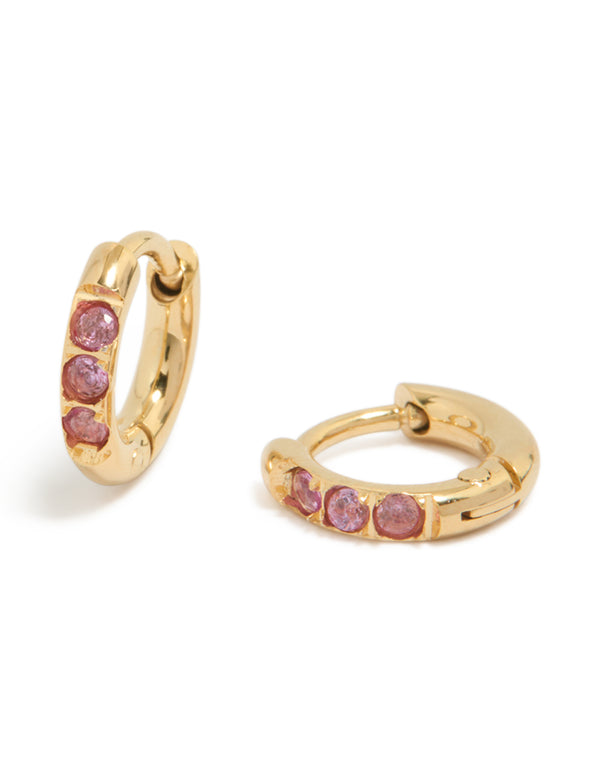 Waterproof gold plated stainless steel pink cubic zirconia huggie earrings front view