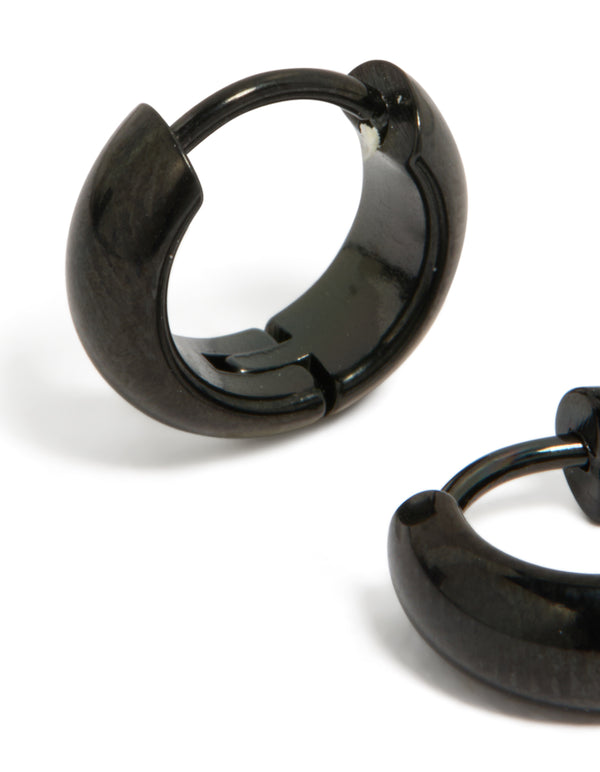 A detailed look at waterproof black coated stainless steel chunky huggie earrings close up view