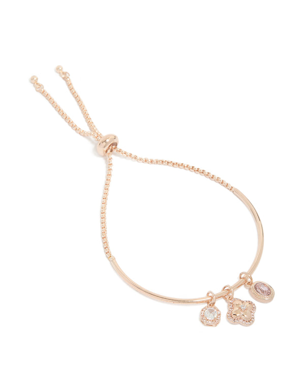Showcasing a rose gold plated cubic zirconia flower charm toggle bangle front view