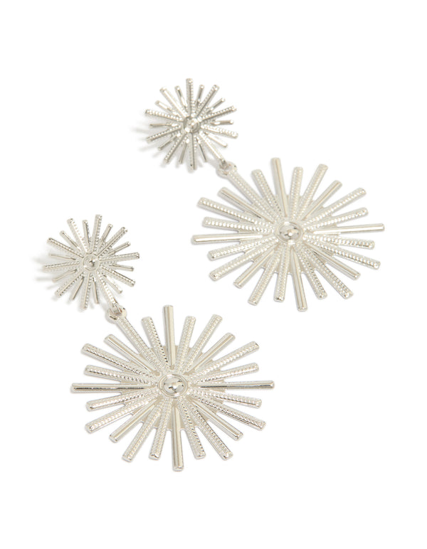 Showcasing statement double spike drop earrings with celestial starburst design in silver front view