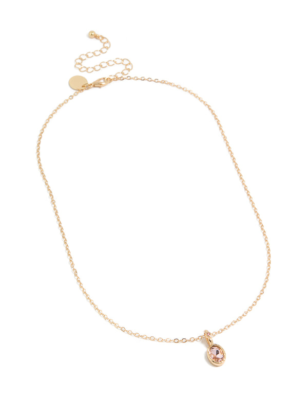 Elegantly designed pink diamante round pendant charm necklace in gold with adjustable clasp front view