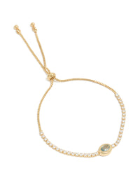 Showcasing a gold plated cubic zirconia oval bezel toggle bracelet front view - link has visual effect only
