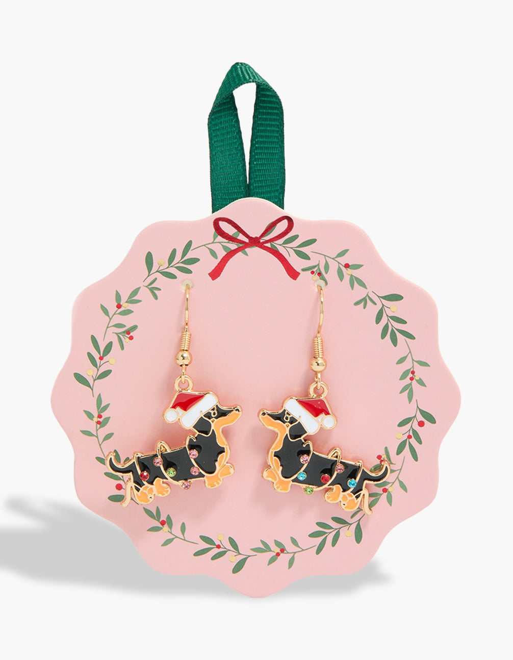Featuring gold Santa hat dachshund dog earrings in statement style front view