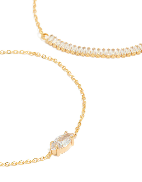 A close look at gold plated cubic zirconia bracelets featuring marquise, baguette stone cuts close up view