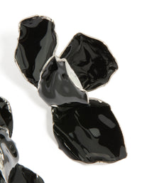 Showcasing dainty mini petal drop earrings with floral design in black coated metal and silver finish close up view - link has visual effect only