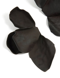 Featuring coated metal half flower petal drop earrings in black with statement style close up view - link has visual effect only