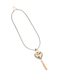 Discover a mixed metal chunky heart tassel cord layered necklace with charm accents in silver and gold front view - link has visual effect only