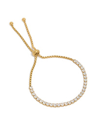 Crafted from waterproof stainless steel, this gold plated cubic zirconia tennis toggle bracelet features design front view - link has visual effect only