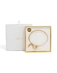 Featuring waterproof gold plated stainless steel construction, this cubic zirconia tennis toggle bracelet is elegantly packaged close up view - link has visual effect only