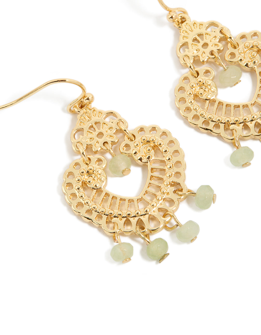 Featuring gold plated charm beads and pale green semi precious stone decorative drop earrings close up view