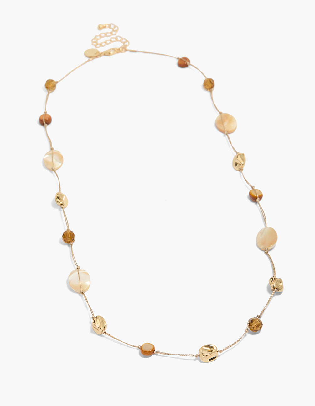 Featuring a gold plated brown and cream stone cord necklace with beads in statement style front view
