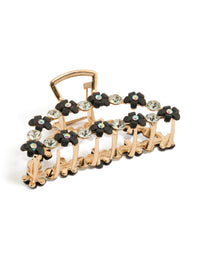 Showcasing a statement claw clip featuring floral design with mixed diamante stones crafted from resin in gold and black front view - link has visual effect only