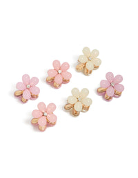 Discover these mini claw clips featuring floral resin design in light pink and beige with gold accents front view - link has visual effect only