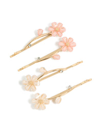 Featuring gold daisy flower clips 4-pack with floral charm in resin front view - link has visual effect only