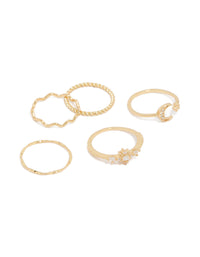 Showcasing celestial cubic zirconia gold plated statement rings featuring star and moon designs front view - link has visual effect only
