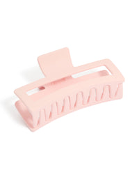 Showcasing a misty rose matte rectangle extra large claw clip front view - link has visual effect only