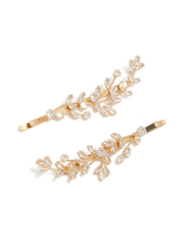 Showcasing leaf vine detailed clips crafted from cubic zirconia in gold front view