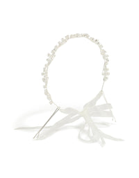 Showcasing a multi shaped cubic zirconia vine headband with bow in silver front view - link has visual effect only