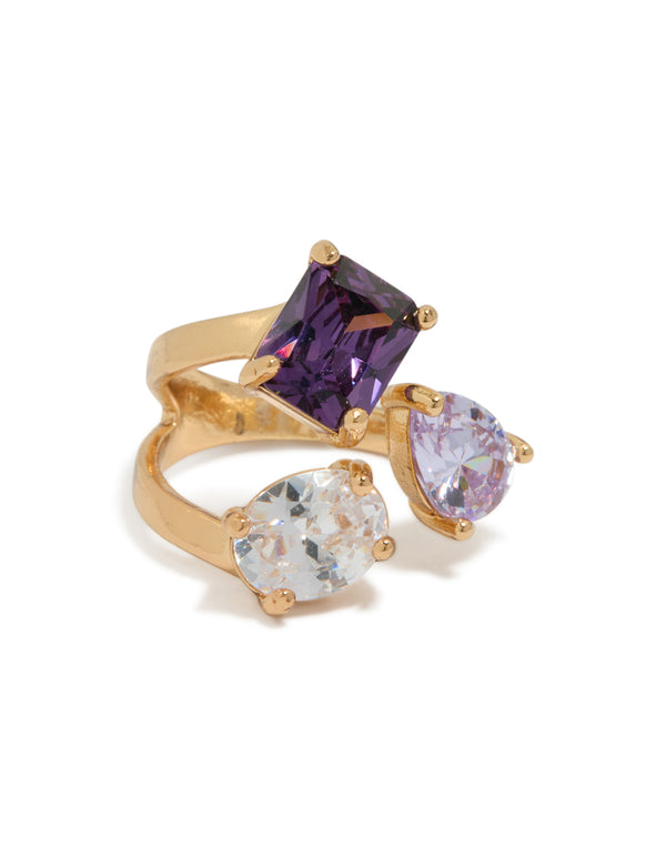 Showcasing a gold plated multi cubic zirconia statement ring featuring purple and lavender stones side detail view