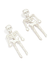 Showcasing silver dangly skeleton earrings design in white front view - link has visual effect only