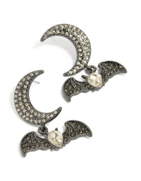 Showcasing bat and moon drop earrings with celestial features in silver front view - link has visual effect only