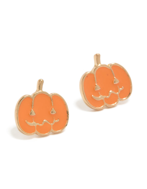 Featuring gold pumpkin face stud earrings in orange front view