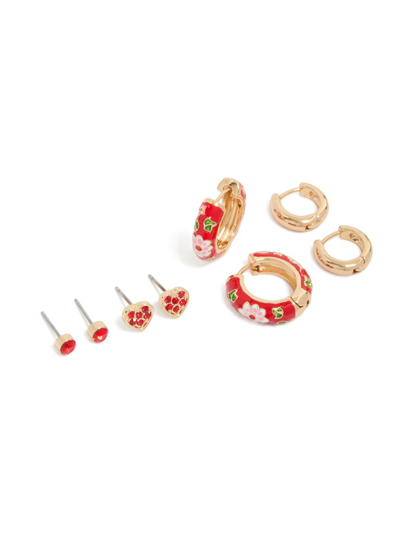 Showcasing gold red enamel huggie and stud earrings in a 3-pack featuring floral heart leaf patterns with cubic zirconia white green accents front view
