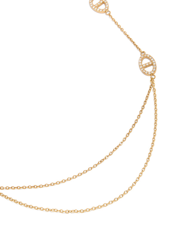 Showcasing a waterproof double chain necklace crafted from stainless steel with plated finish, featuring embellishments and oval design with cubic zirconia stones in clear close up view