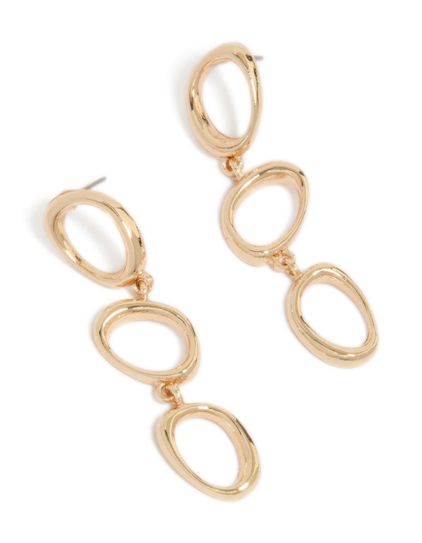 Showcasing gold organic circles trio drop earrings front view