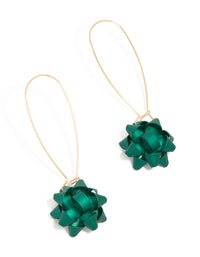 Showcasing statement hook earrings featuring bow accents in teal and gold front view - link has visual effect only