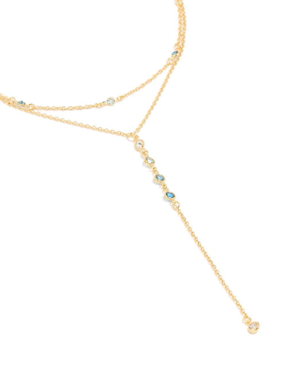 Featuring a gold plated bezel cubic zirconia station layered Y-necklace close up view
