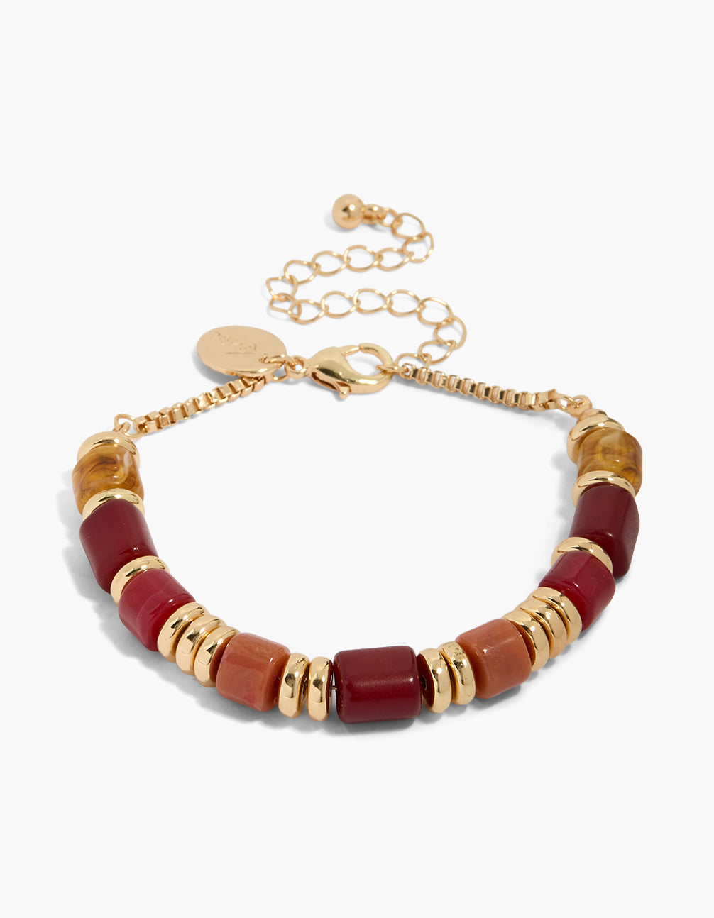 Showcasing a beaded statement bracelet in gold with maroon and sienna rectangular beads front view
