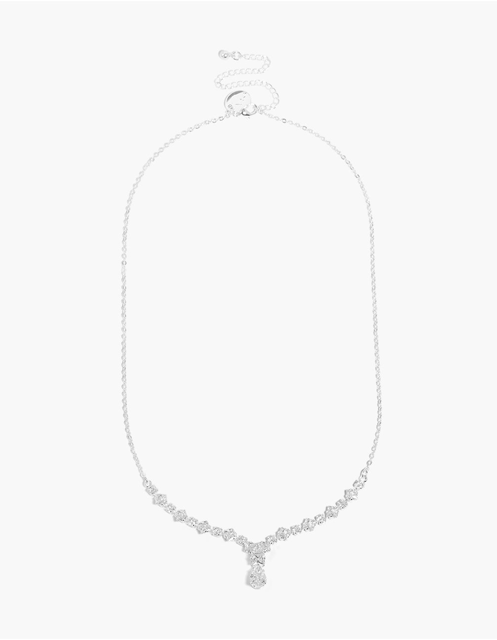 Featuring a small graduating cubic zirconia Y-necklace in silver plated metal with dainty craftsmanship and clasp detail view